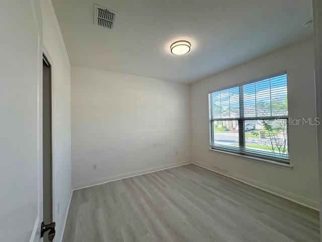 7408 Wing Span Way Harmony, FL 34773 - Photo 18 of 30 an empty room with a window