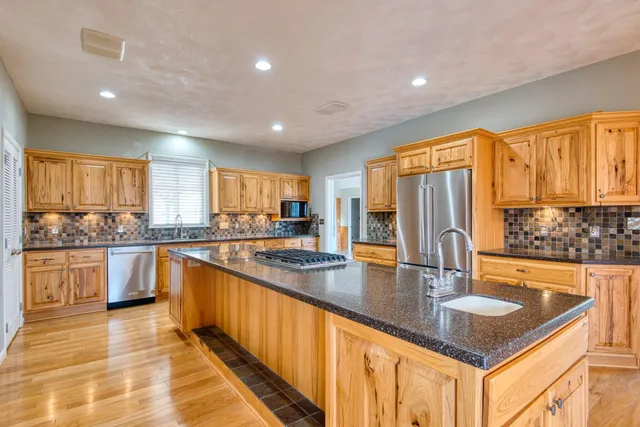 a bathroom with a shower and a toilet