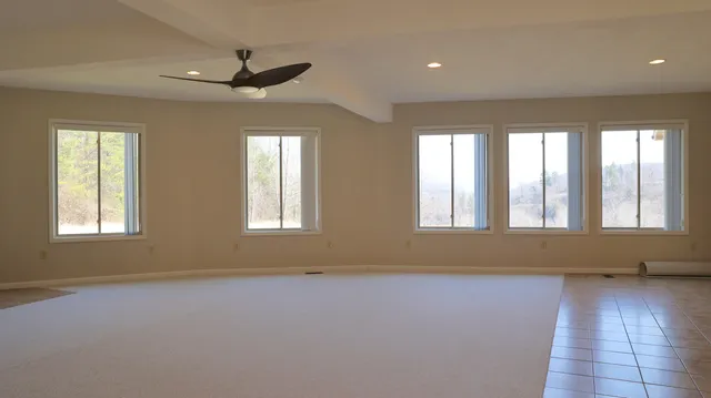 a view of a backyard of the house