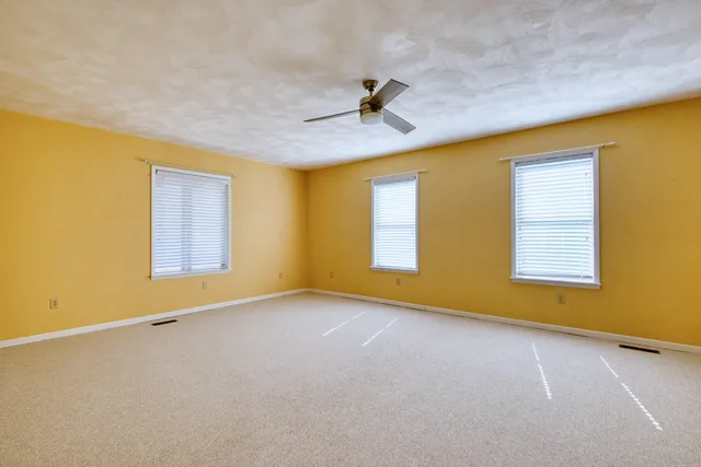 a view of an ocean and a mountain