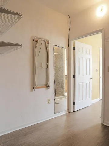 a view of a field with an ocean