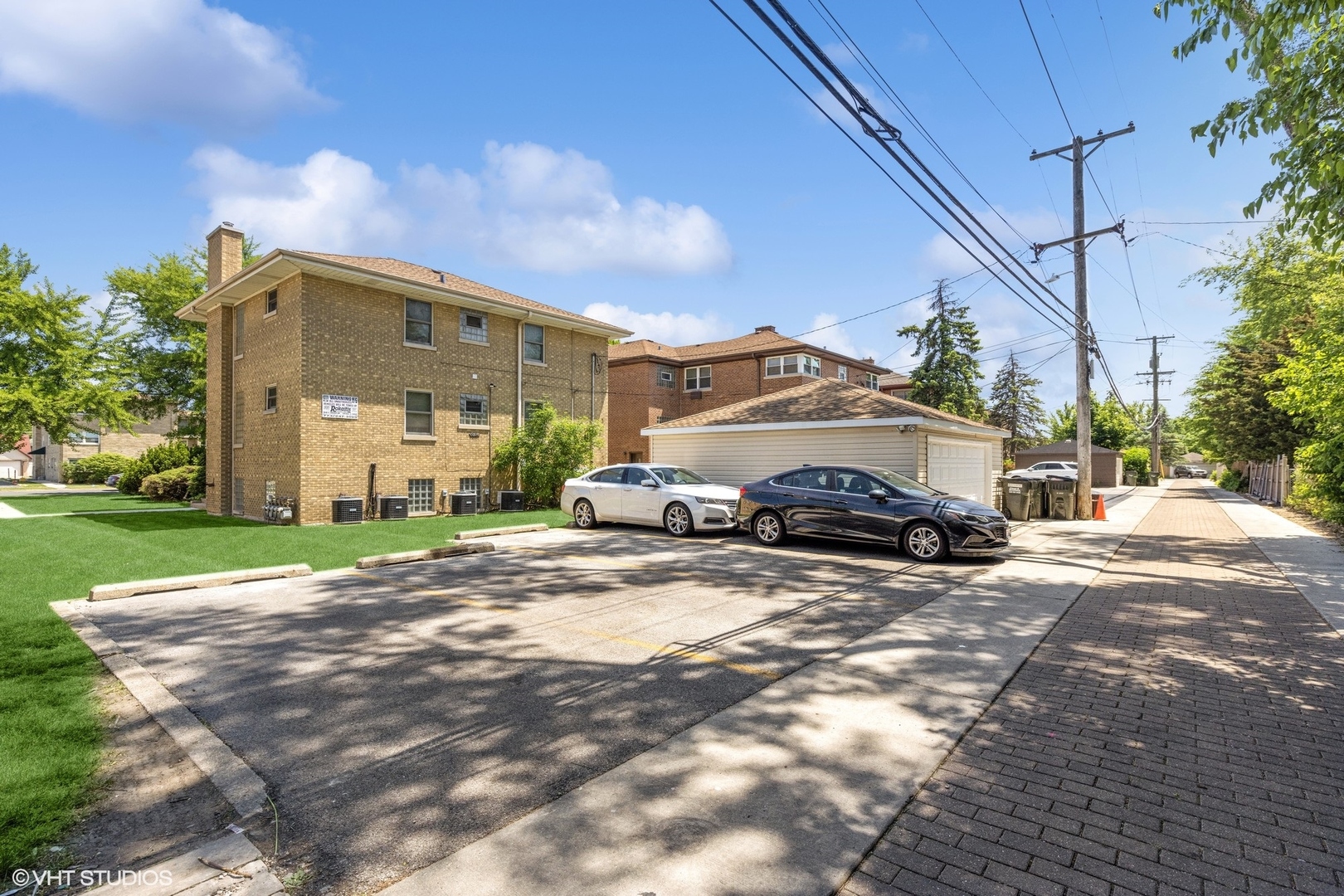 3024 Harlem Avenue Riverside, IL 60546 - Photo 11 of 12 a car parked in front of a house
