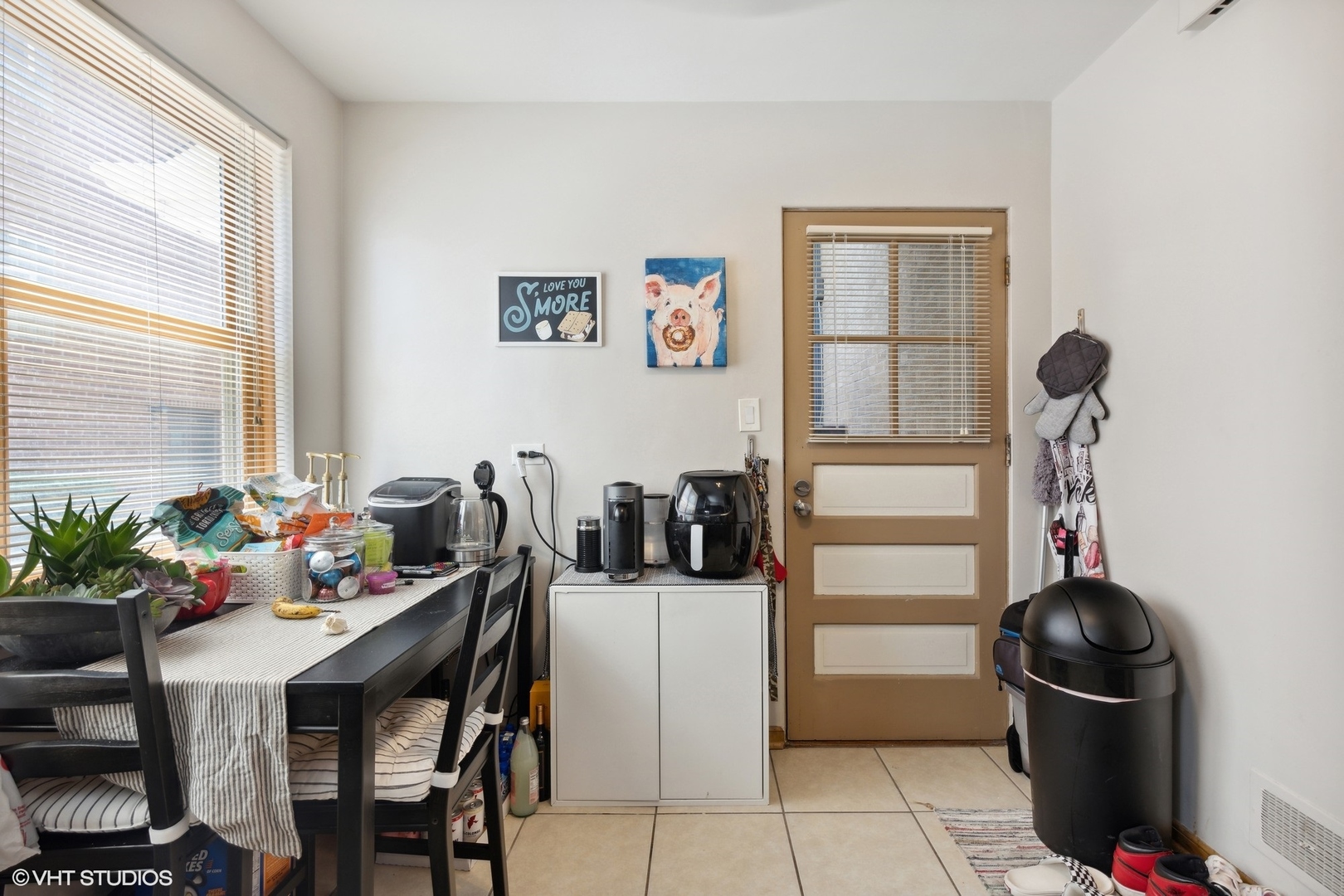3024 Harlem Avenue Riverside, IL 60546 - Photo 4 of 12 a kitchen with stainless steel appliances dining table and chairs