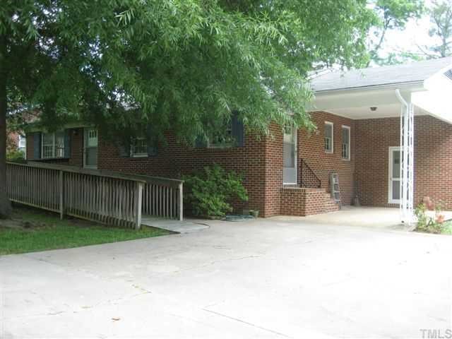 309 Pine Tree Road Oxford, NC 27565 - Photo 2 of 6 Side View with 1 car carport