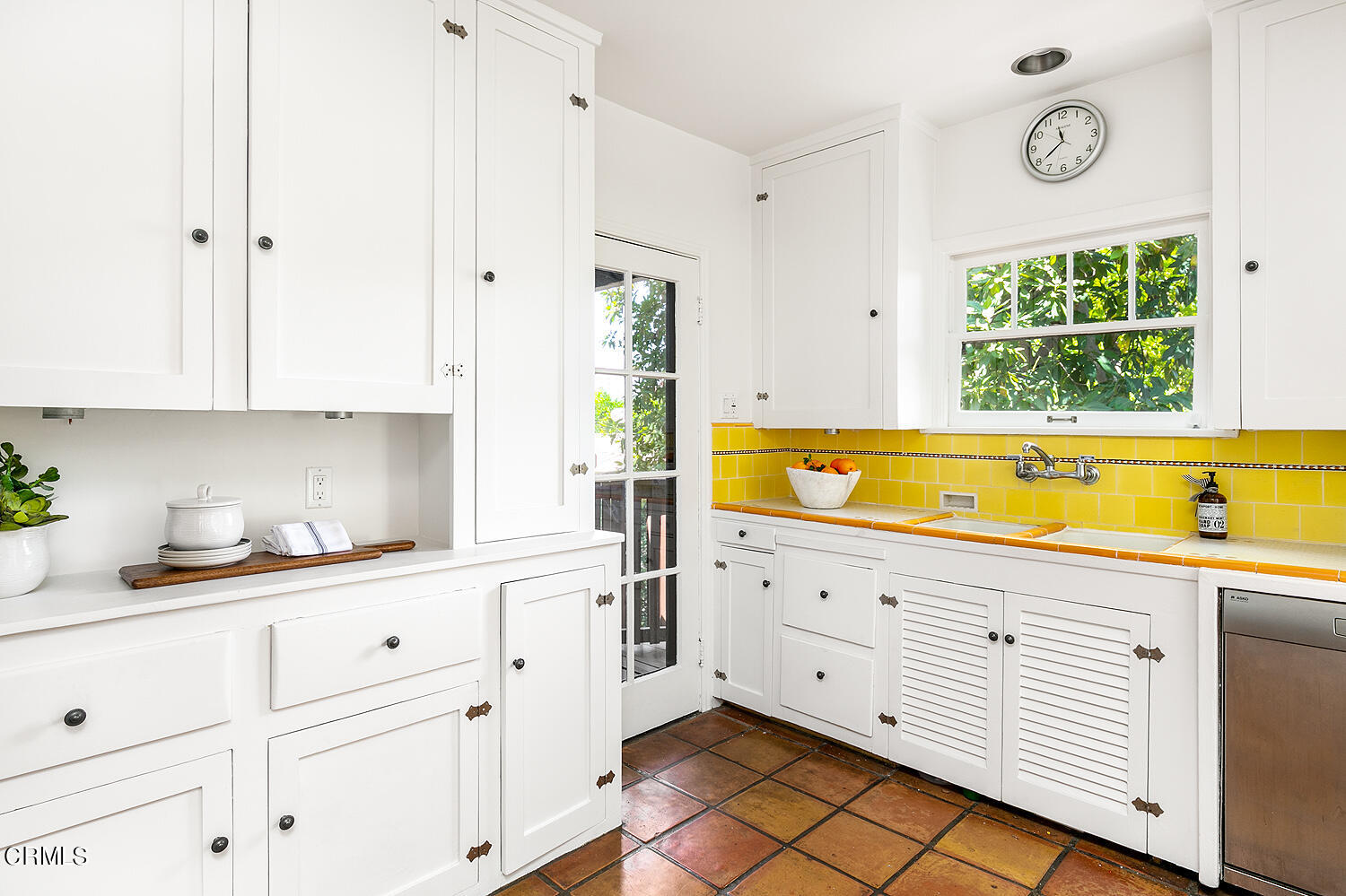 1317 Gates Place South Pasadena, CA 91030 - Photo 19 of 49 a kitchen with stainless steel appliances white cabinets and a window