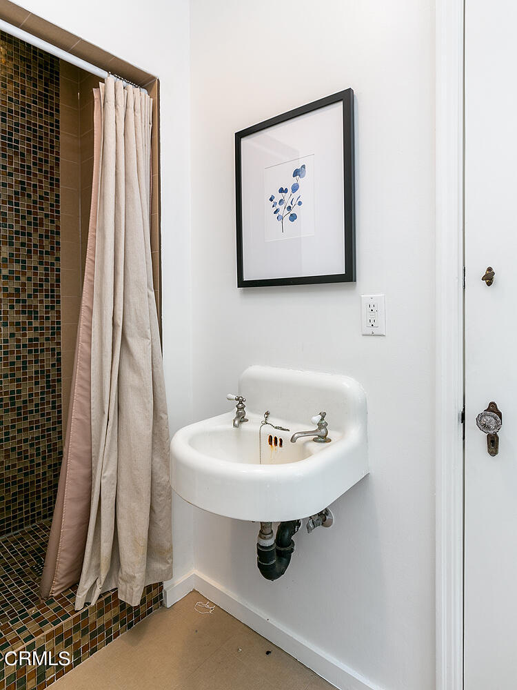 1317 Gates Place South Pasadena, CA 91030 - Photo 25 of 49 a bathroom with a sink and a mirror