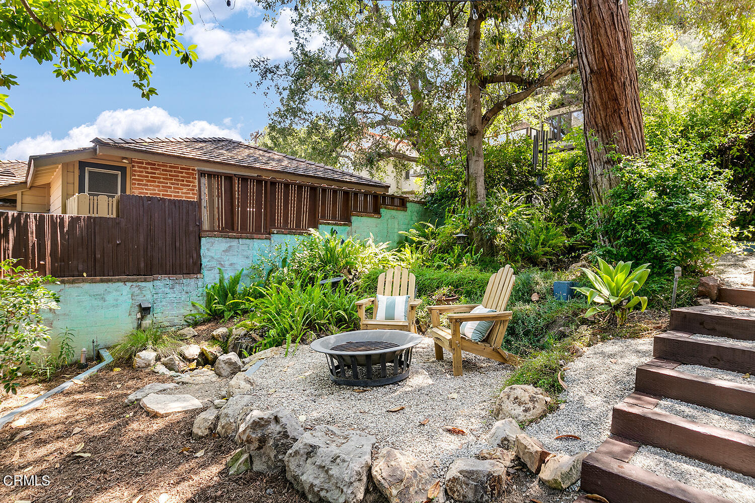1317 Gates Place South Pasadena, CA 91030 - Photo 43 of 49 a view of a backyard with potted plants and large trees
