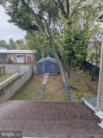 a view of a deck with a yard