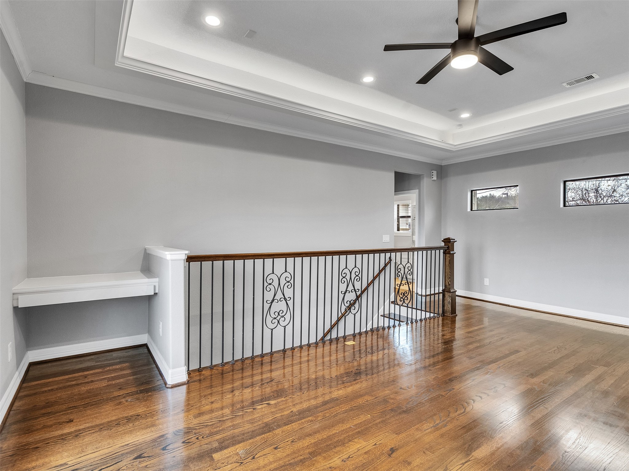 5814 Luna Street Houston, TX 77076 - Photo 31 of 44 a view of entryway and hall with wooden floor