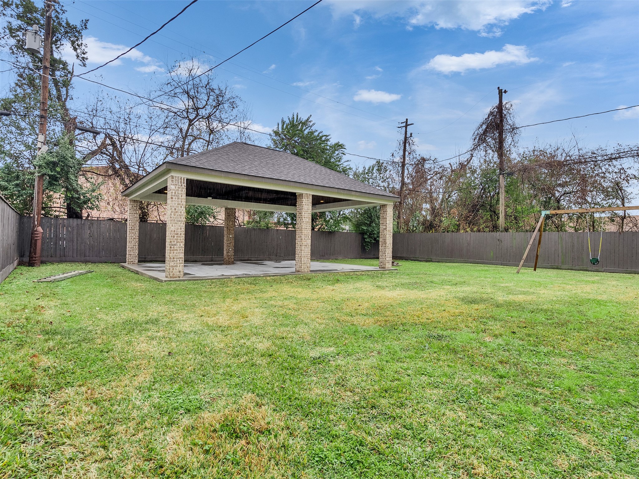 5814 Luna Street Houston, TX 77076 - Photo 37 of 44 a view of a house with a backyard