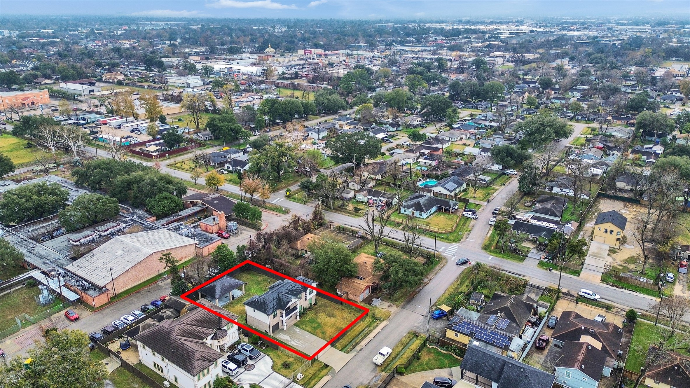 5814 Luna Street Houston, TX 77076 - Photo 41 of 44 an aerial view of a city with lots of residential buildings