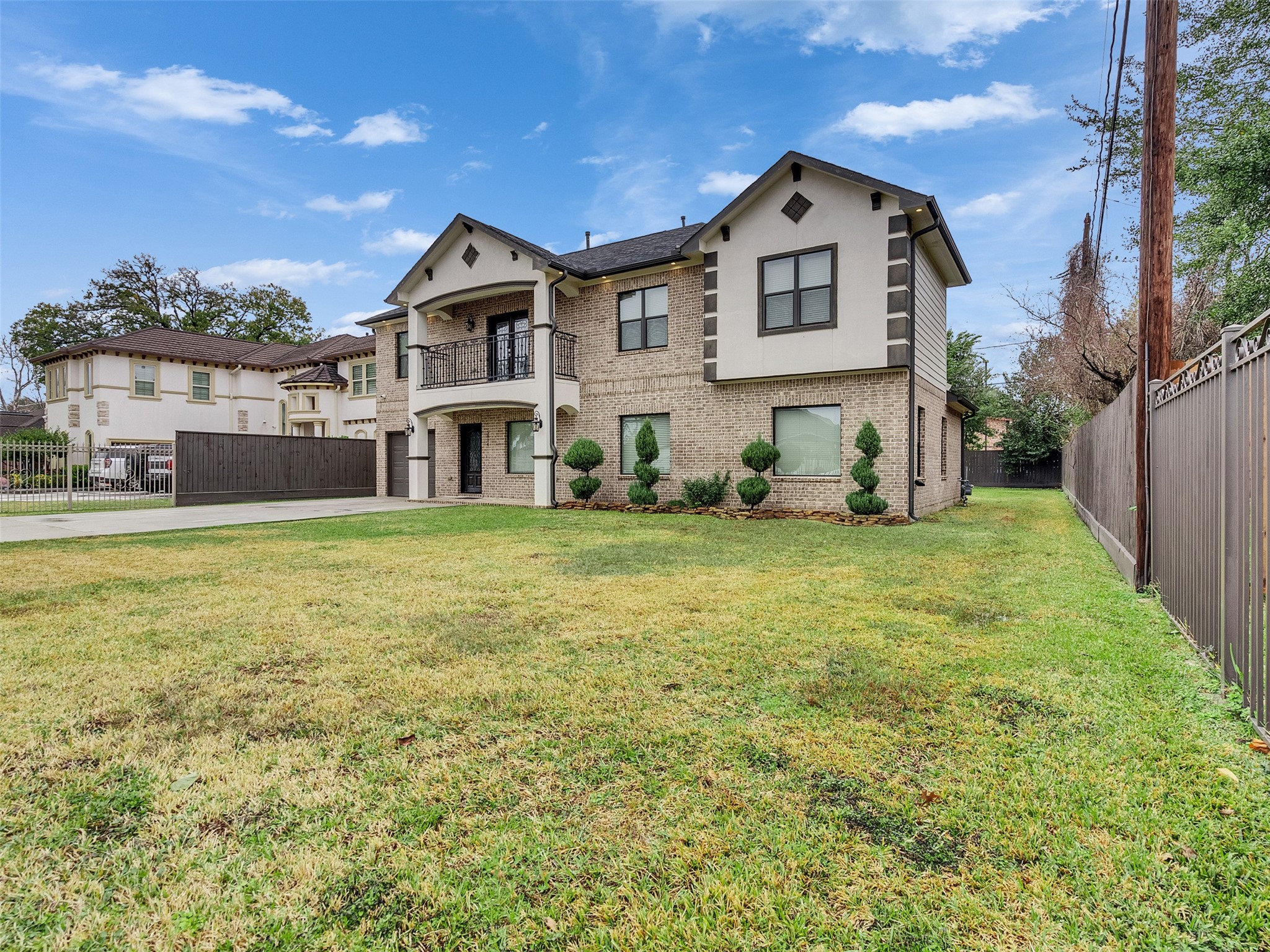 5814 Luna Street Houston, TX 77076 - Photo 5 of 44 a front view of a house with a yard