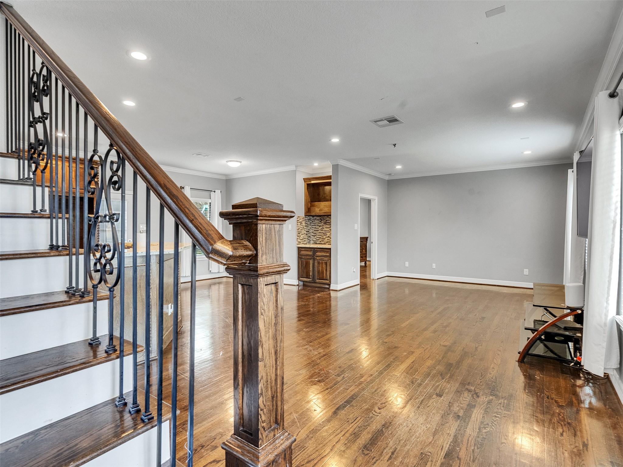 5814 Luna Street Houston, TX 77076 - Photo 6 of 44 a view of an entryway with wooden floor