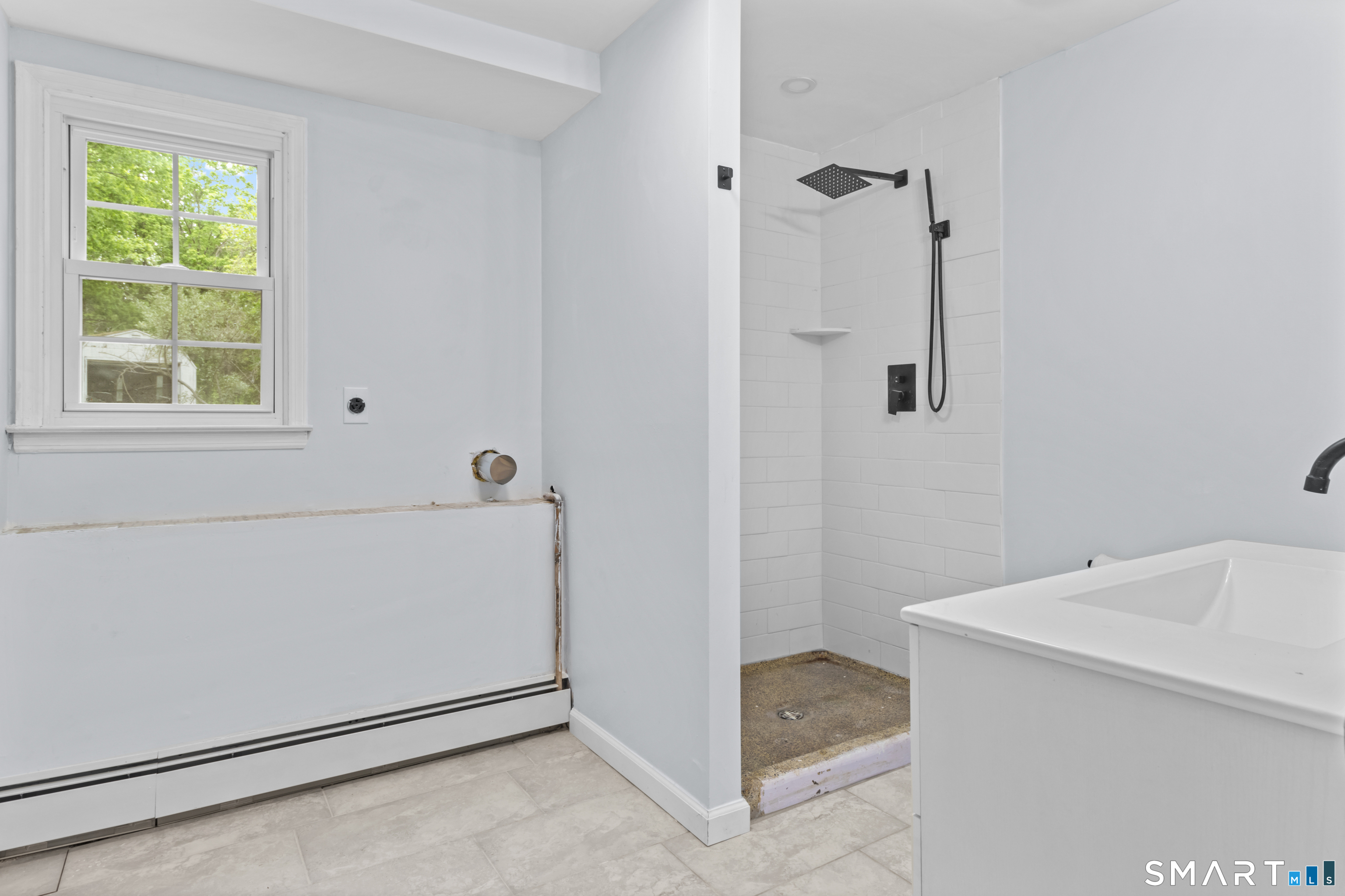 20 Quiet Woods Road East Hampton, CT 06424 - Photo 29 of 40 a bathroom with a bathtub and a shower