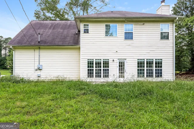 a house view with a garden space