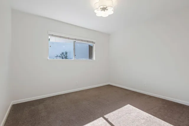 an empty room with a workspace