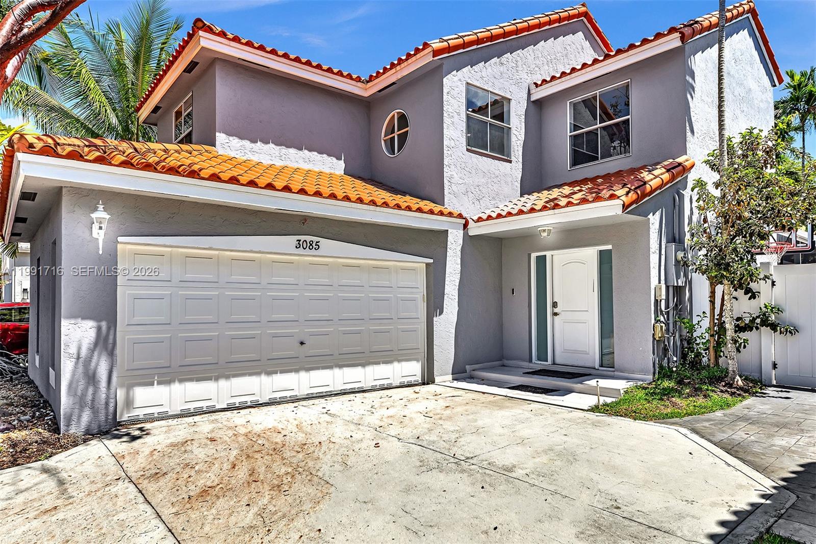 3085 North 36th Avenue Hollywood, FL 33021 - Photo 1 of 76 a view of a house with a garage