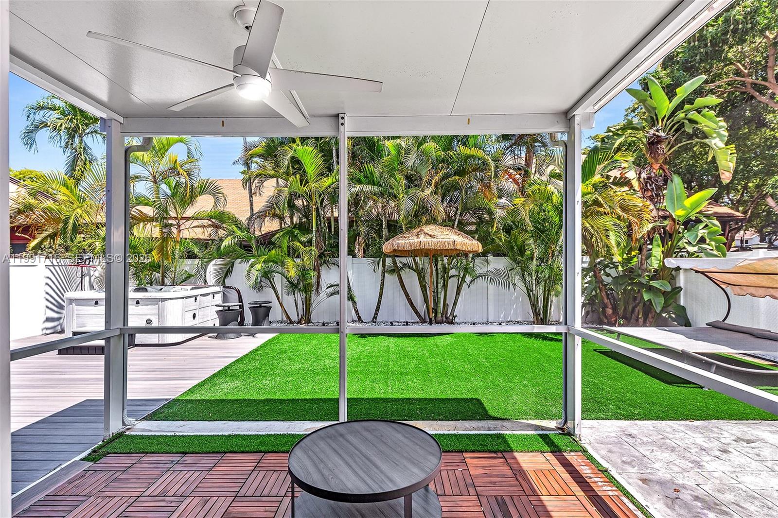 3085 North 36th Avenue Hollywood, FL 33021 - Photo 50 of 76 a view of a chair and table in backyard of the house