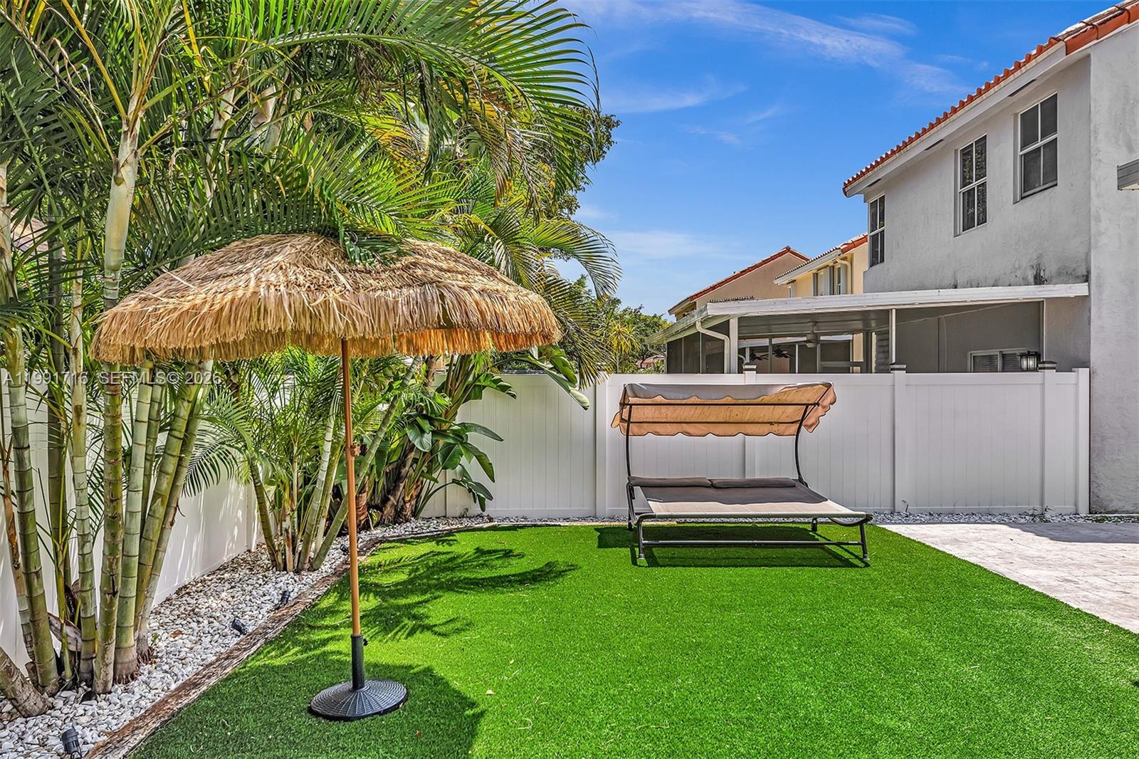 3085 North 36th Avenue Hollywood, FL 33021 - Photo 60 of 76 a backyard of a house with lots of green space