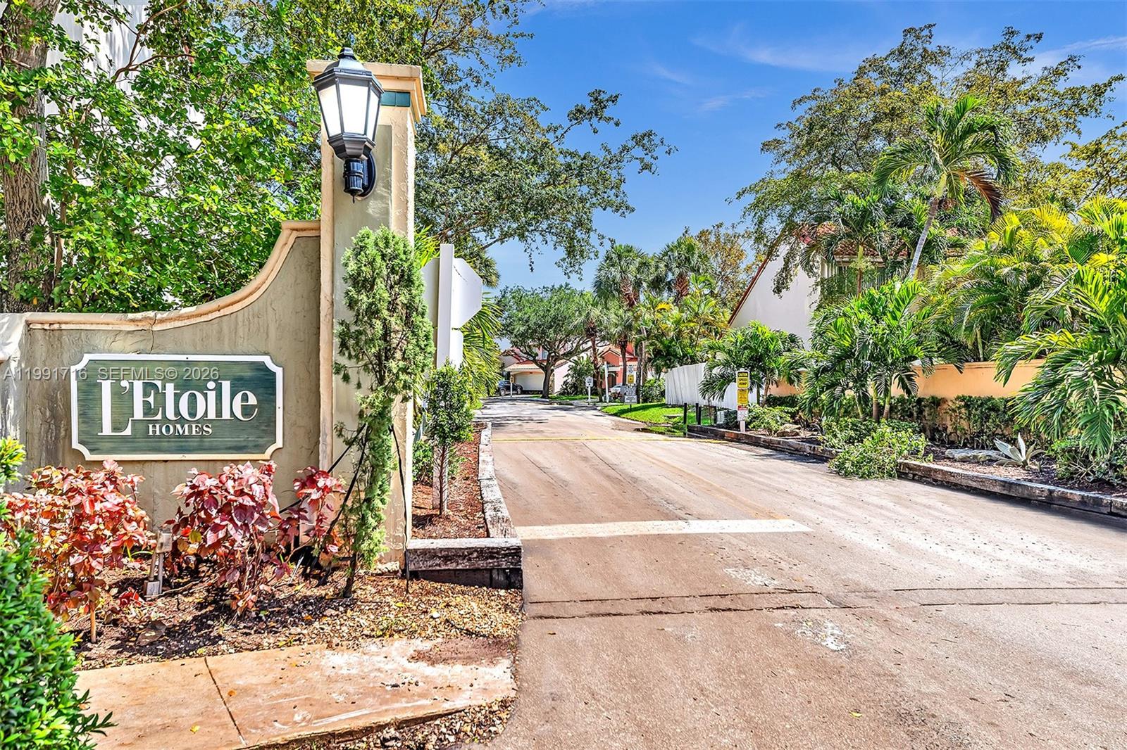 3085 North 36th Avenue Hollywood, FL 33021 - Photo 66 of 76 a street sign on a sidewalk next to a road