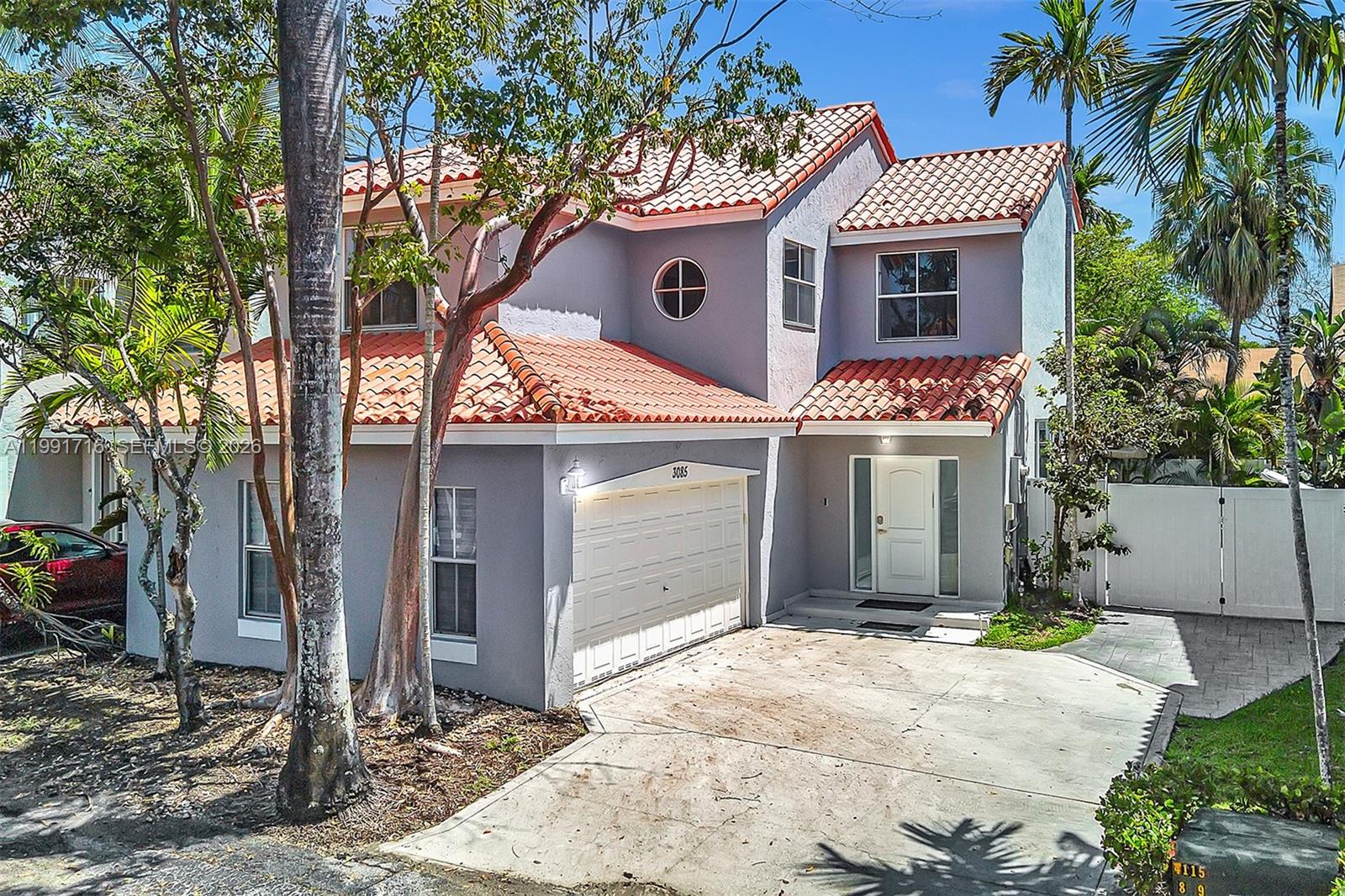 3085 North 36th Avenue Hollywood, FL 33021 - Photo 67 of 76 a front view of a house with garden