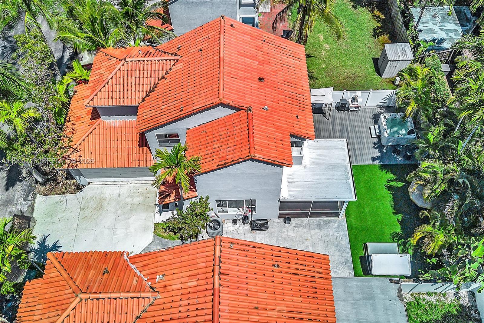 3085 North 36th Avenue Hollywood, FL 33021 - Photo 70 of 76 a backyard of a house with plants and outdoor seating