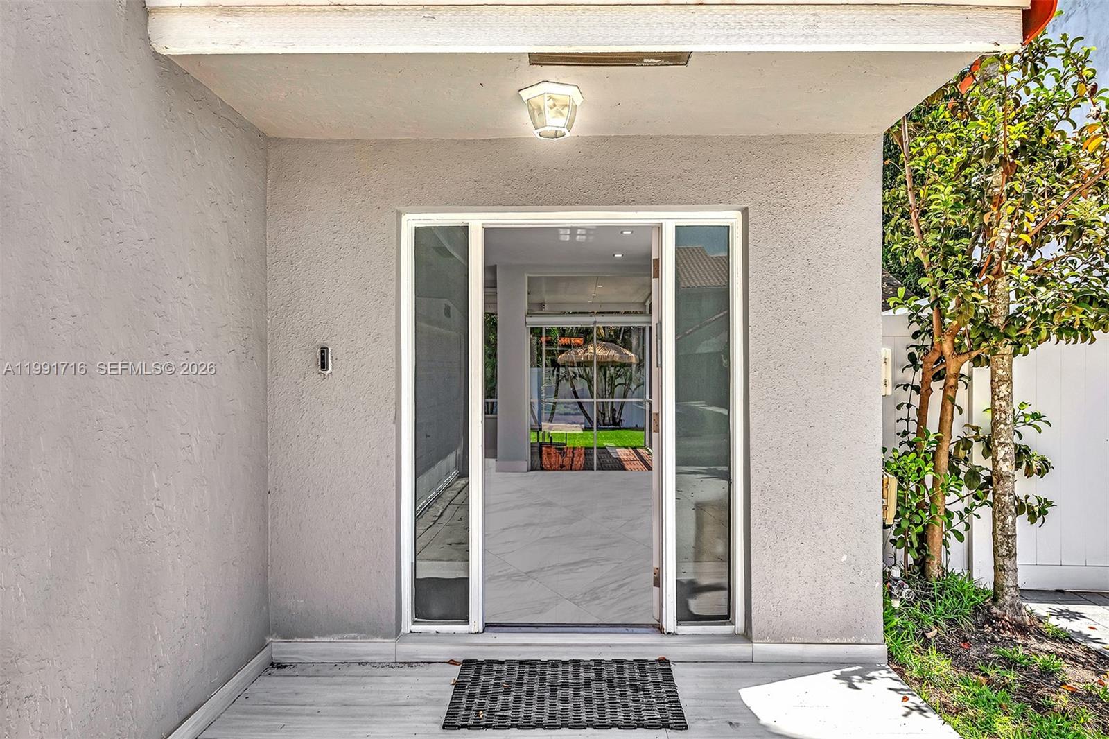 3085 North 36th Avenue Hollywood, FL 33021 - Photo 7 of 76 a view of a entryway door of the house