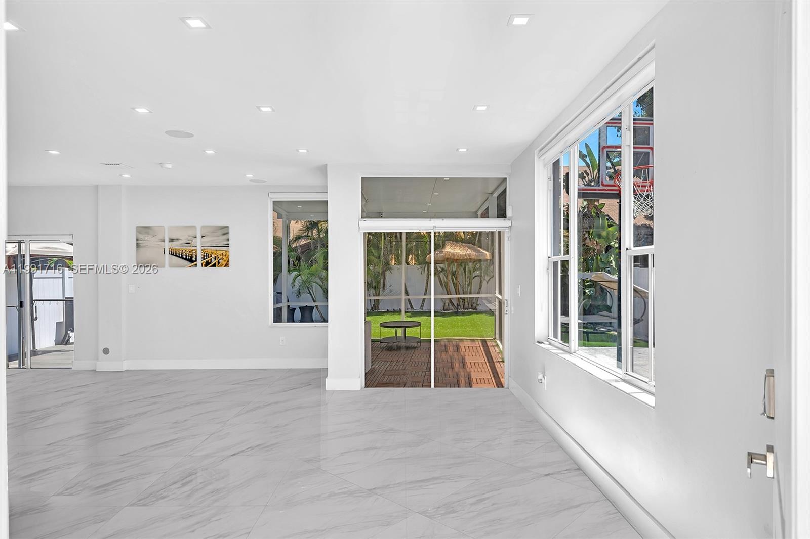 3085 North 36th Avenue Hollywood, FL 33021 - Photo 8 of 76 a view of an entryway with wooden floor