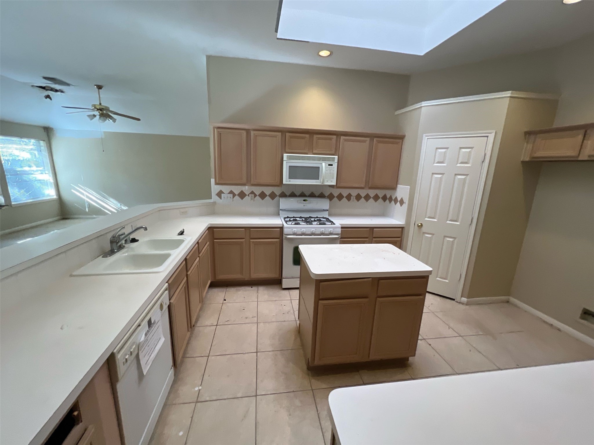 17111 Valley Palms Drive Spring, TX 77379 - Photo 23 of 29 a kitchen with a cabinets and sink