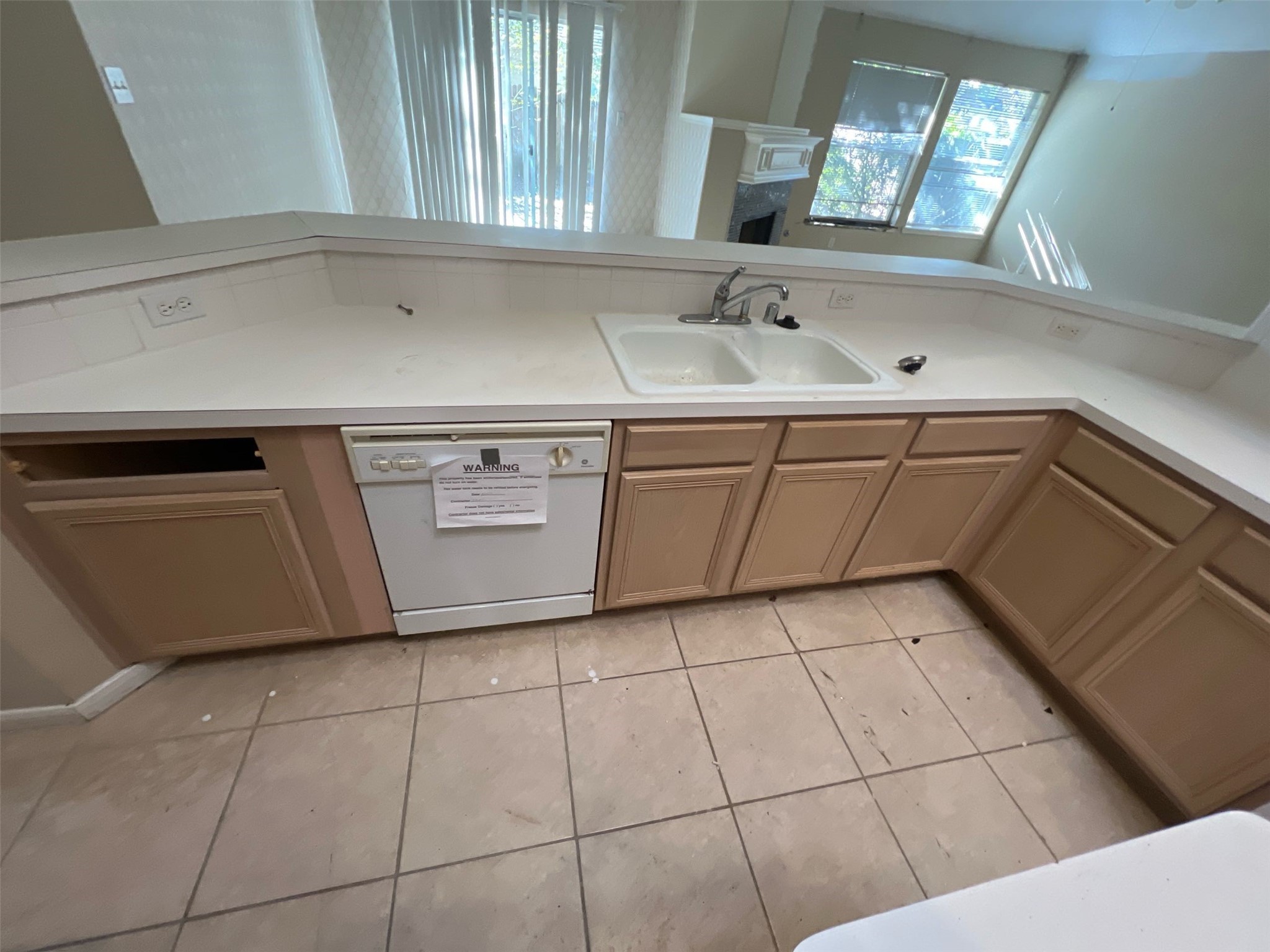17111 Valley Palms Drive Spring, TX 77379 - Photo 29 of 29 a kitchen with a sink a stove and cabinets