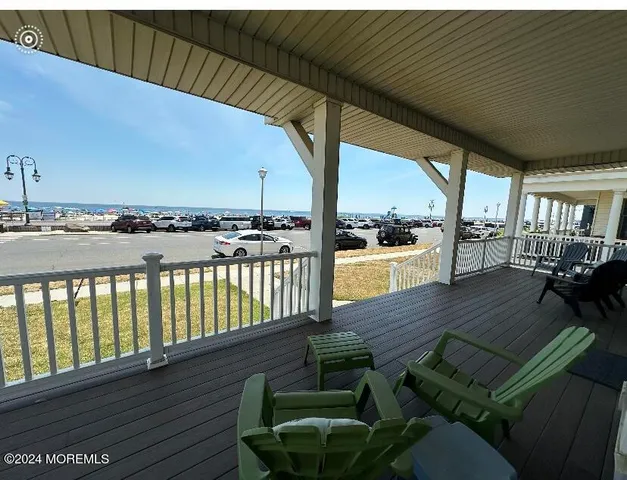 a view of a balcony with chairs
