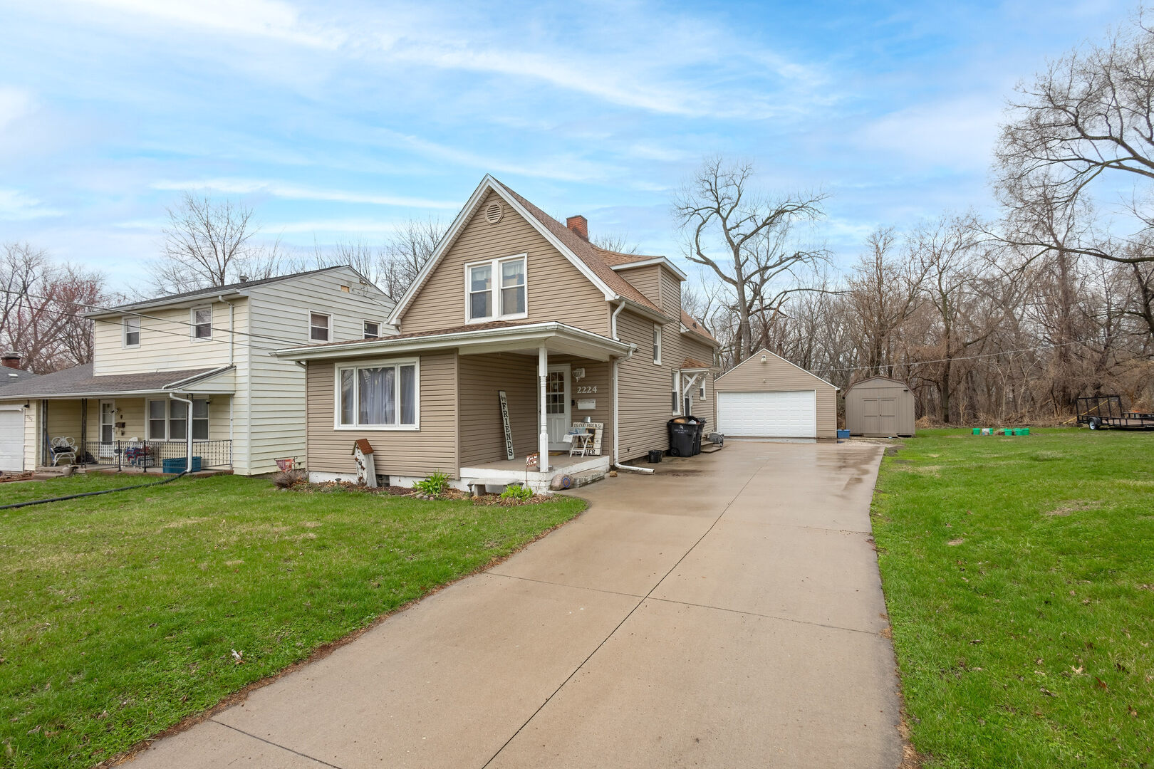 2224 41st Street Rock Island, IL 61201 - Photo 1 of 25 a front view of a house with a yard