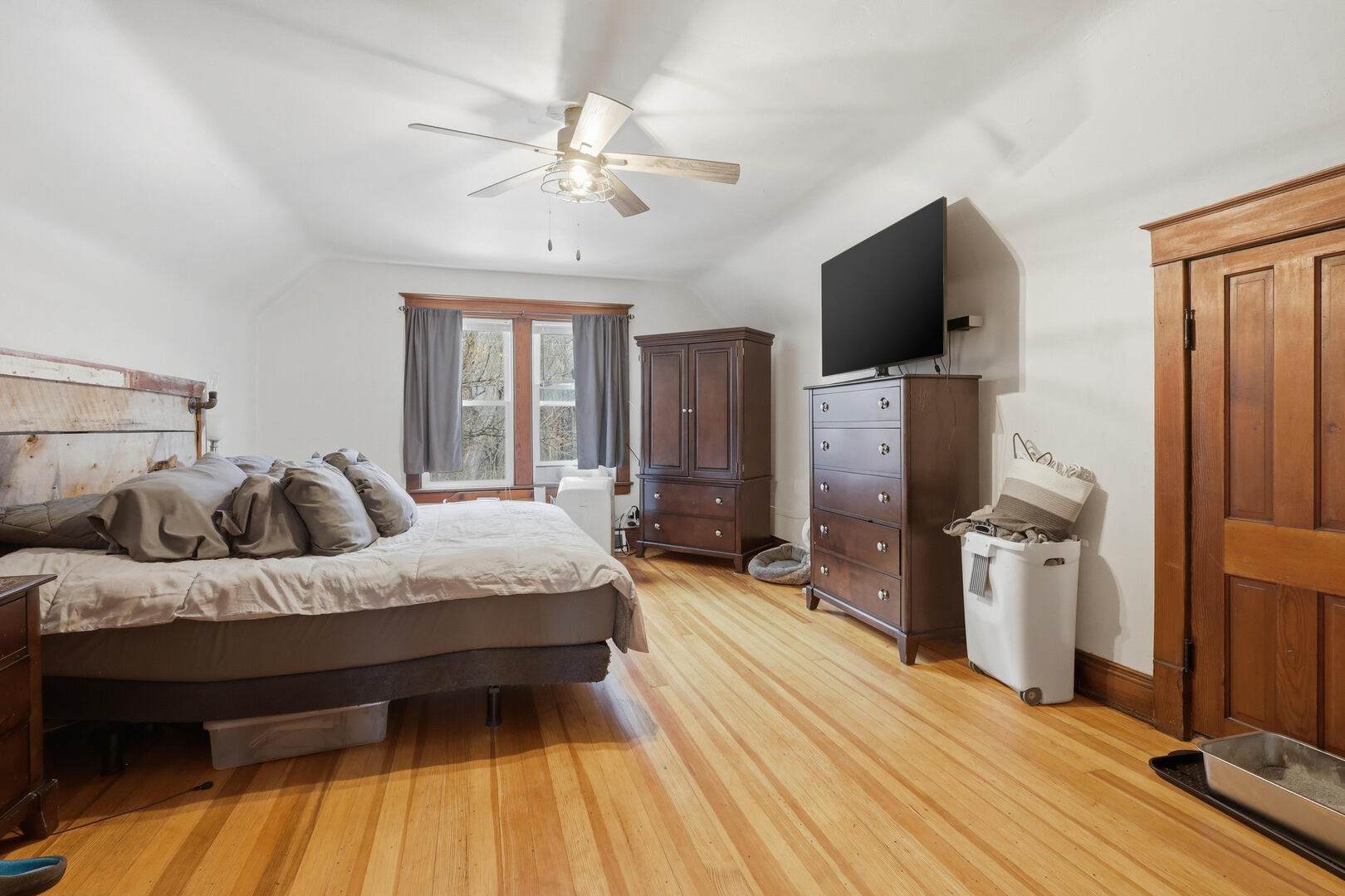 2224 41st Street Rock Island, IL 61201 - Photo 11 of 25 a bedroom with a bed and a flat screen tv