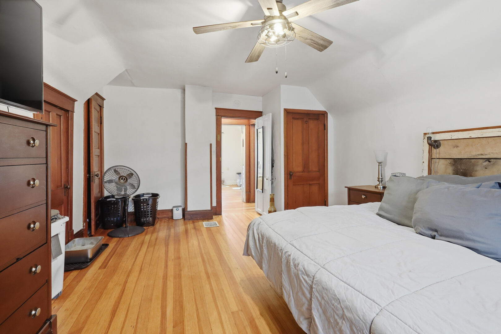 2224 41st Street Rock Island, IL 61201 - Photo 13 of 25 a bedroom with a bed and wooden floor