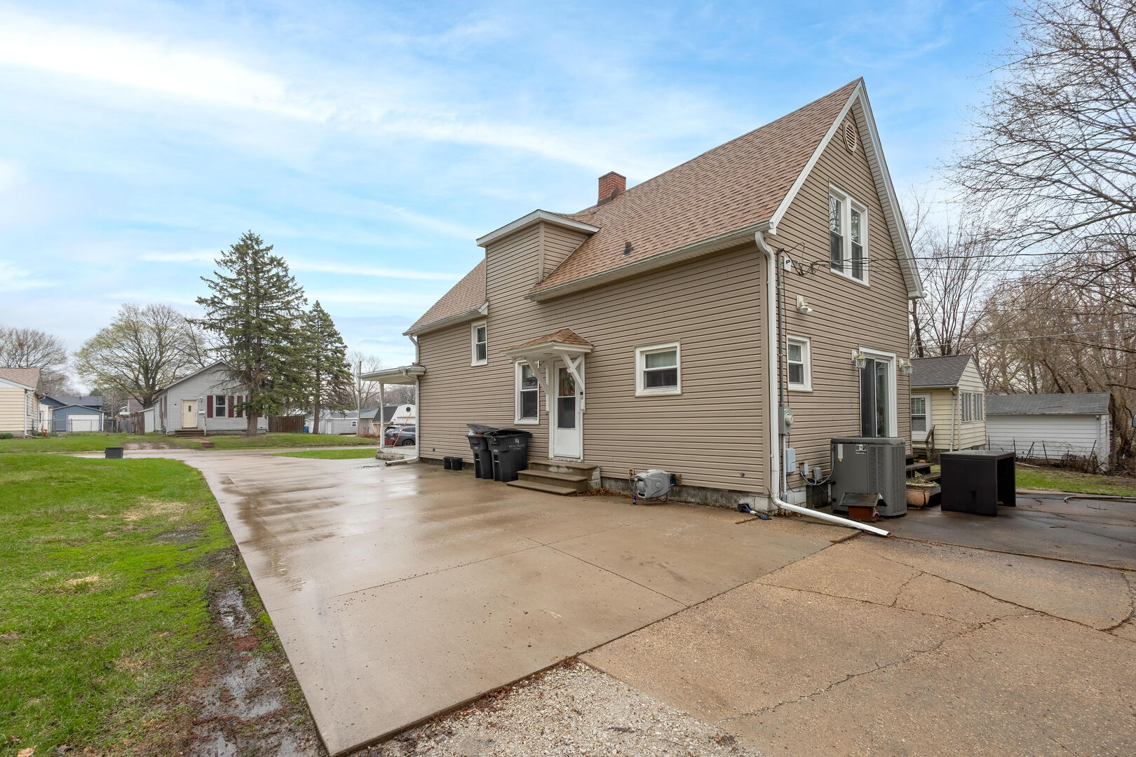 2224 41st Street Rock Island, IL 61201 - Photo 20 of 25 a view of a house with a yard