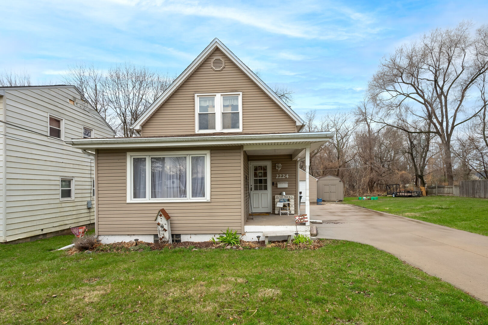 2224 41st Street Rock Island, IL 61201 - Photo 2 of 25 a view of a house with a yard