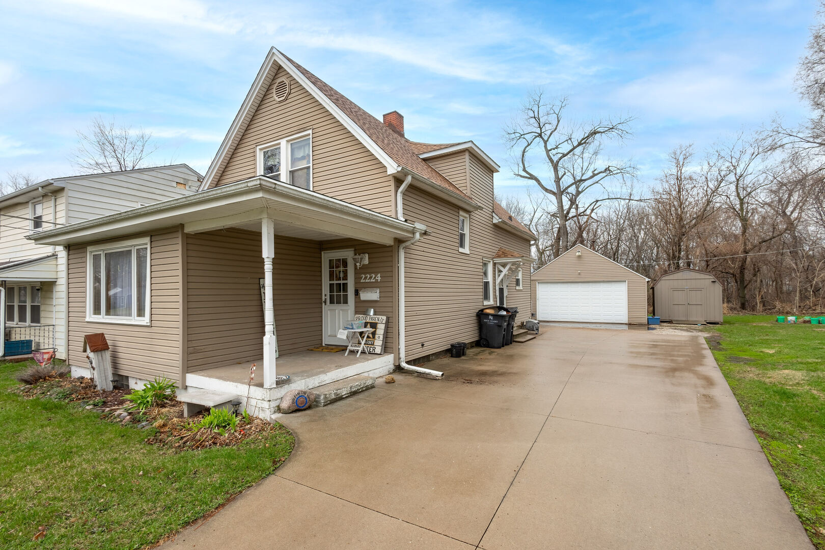 2224 41st Street Rock Island, IL 61201 - Photo 21 of 25 front view of a house with a yard