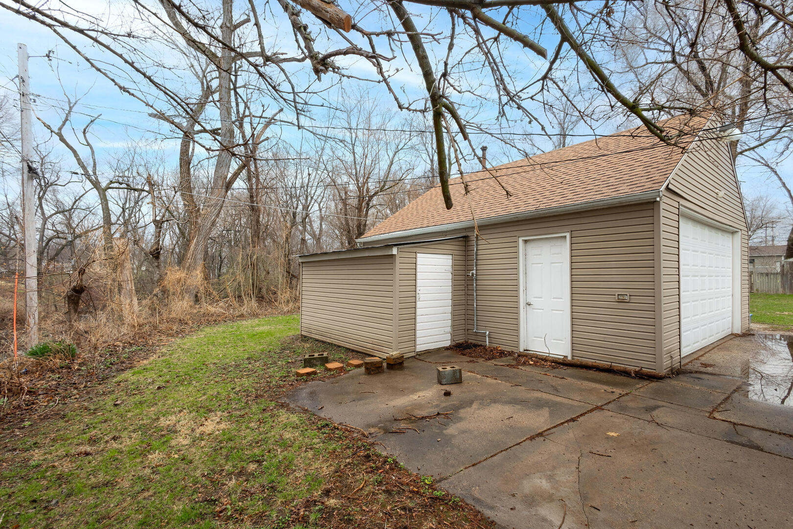 2224 41st Street Rock Island, IL 61201 - Photo 24 of 25 a view of a house with a yard