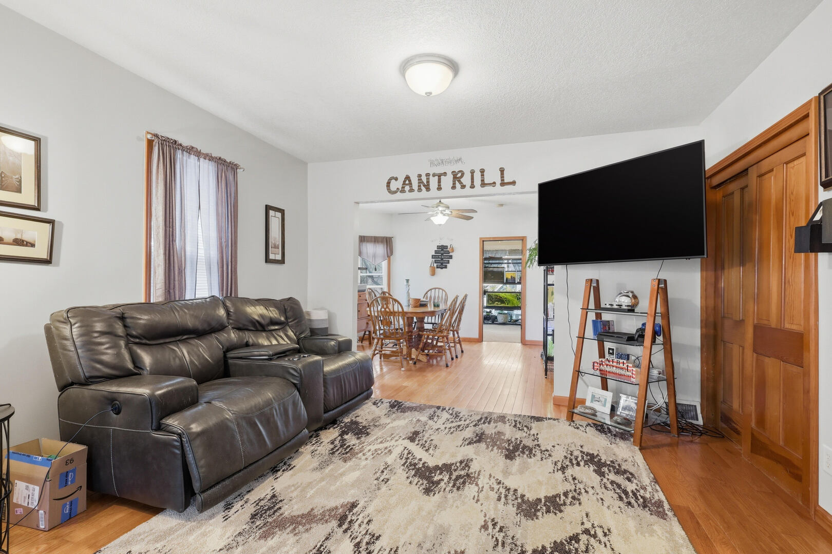 2224 41st Street Rock Island, IL 61201 - Photo 4 of 25 a living room with furniture and a flat screen tv