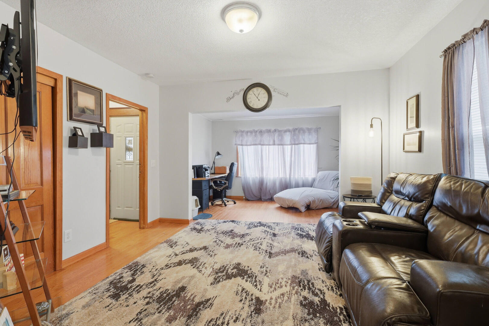 2224 41st Street Rock Island, IL 61201 - Photo 6 of 25 a bedroom with furniture and a window