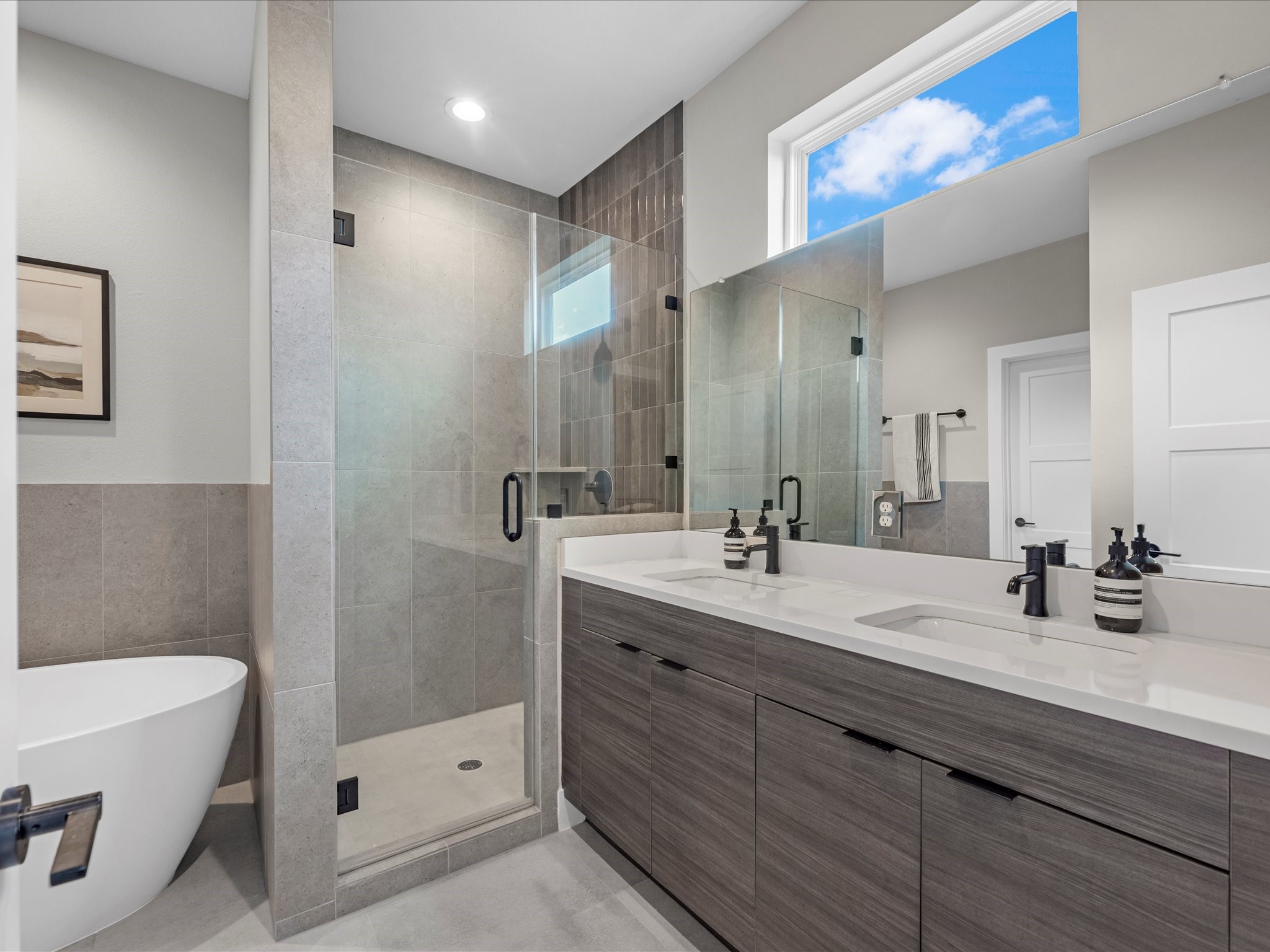 307 Charlock Street Houston, TX 77022 - Photo 15 of 17 Primary bathroom featuring dual vanity sinks.
