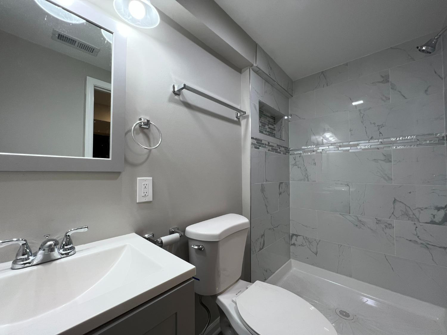 276 North Henry Street Gary, IN 46403 - Photo 22 of 34 a bathroom with a sink toilet and shower