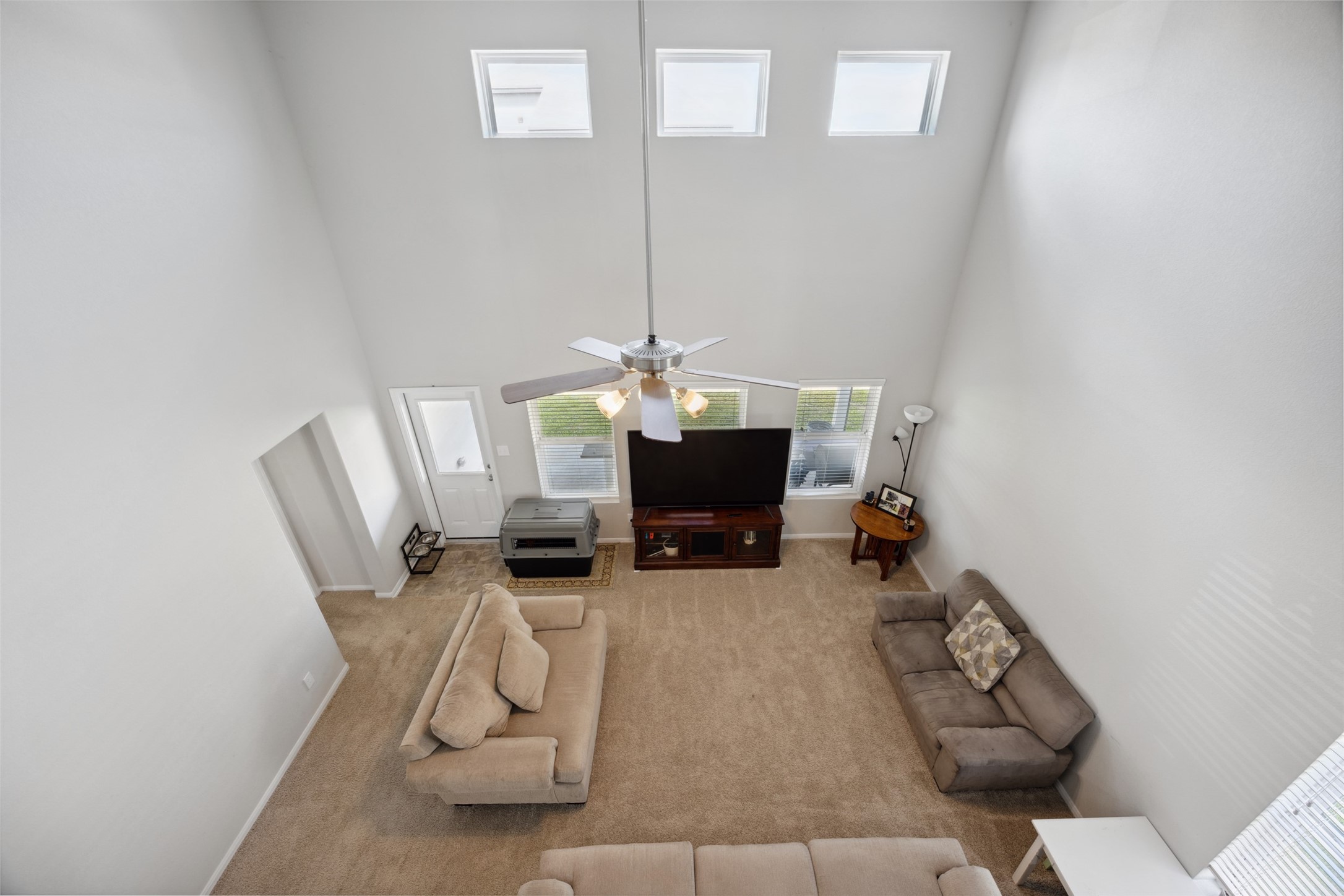 2903 Godric Hollow Ln. Rosenberg, TX 77471 - Photo 11 of 35 a room with furniture and a chandelier