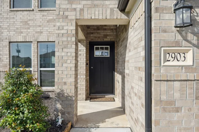 a building with a door and a door