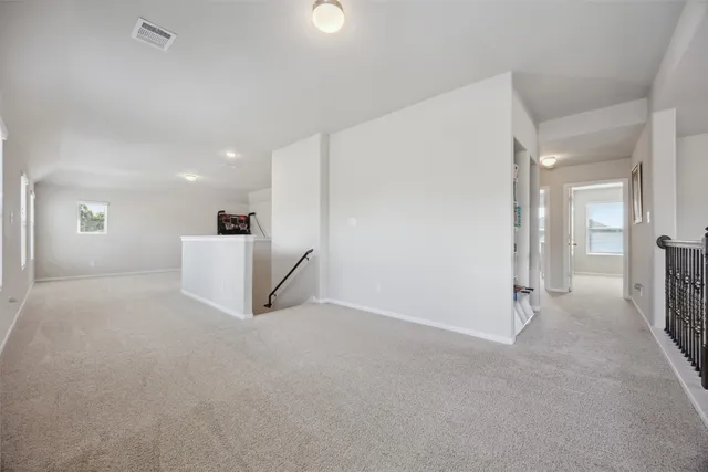a view of a big room with a large mirror
