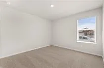 a bathroom with a double vanity sink and mirror