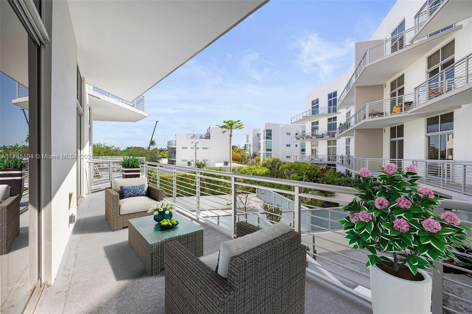 2001 Meridian Avenue, Unit 412 Miami Beach, FL 33139 - Photo 7 of 31 a view of a balcony with couch