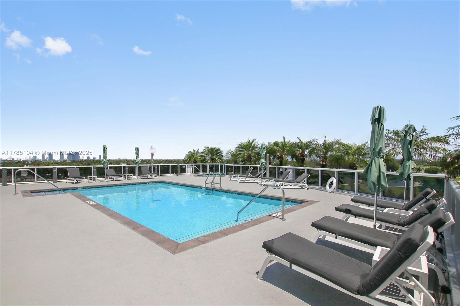 2001 Meridian Avenue, Unit 412 Miami Beach, FL 33139 - Photo 10 of 31 swimming pool with outdoor seating and city view