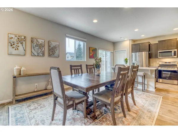 a view of a dining room with furniture