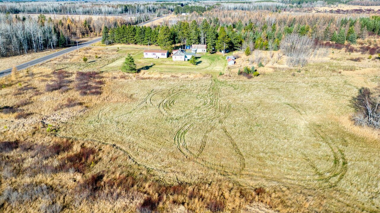 3932 Hwy 100 Aurora Mn 55705 Aurora, MN 55705 - Photo 39 of 44 Overview of rural landscape featuring a forest